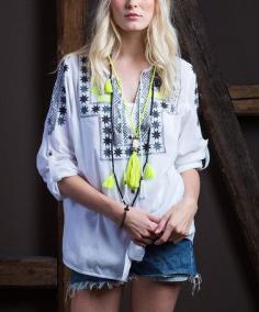 
                    
                        This White Embroidered Notch Neck Top is perfect! #zulilyfinds
                    
                