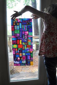 
                    
                        Sharpie on wax paper looks like stained glass. Easy craft for kids
                    
                