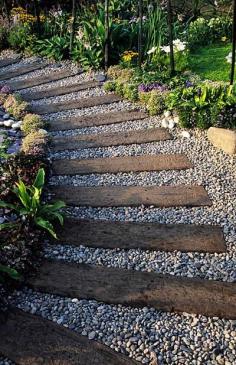DIY Garden Ideas railroad ties and pea gravel path.