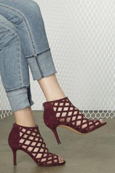 
                    
                        Luxurious suede caged heels with plush foam cushioning for all-day comfort
                    
                