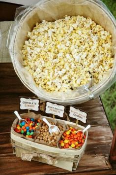 Popcorn bar: great "make your own" party snack, perfect for slumber parties, movie night, etc. - a very cute idea!