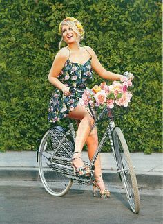
                    
                        Meghan Trainor on a bicycle...Oooh! I like the design of the chain and spoke shield to keep skirts and dresses clean and not get tangled. I wonder who makes the bike, or can I get the shields to attach to the bike I have?
                    
                