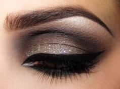 Gorgeous brown eye shadow with metallic glitter accent.