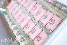 make customized labels with party theme on them to replace mini chocolate bar wrappers (leaving the foil intact)
