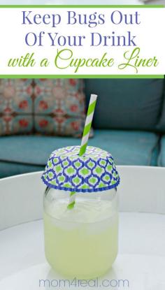 Cupcake liner, mason jar, and straw. Nice drink decoration and keeps bugs out of your drinks.