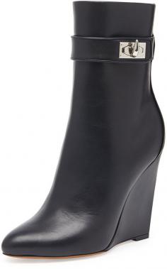 $697, Black Leather Wedge Ankle Boots: Givenchy Shark Lock Wedge Ankle Boot Black. Sold by Neiman Marcus.