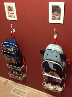 Put hooks and low shelves on opposite wall for kids' backpacks and mittens. One idea if you didn't want to go with a full scale mudroom organizer.