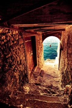 Passageway to the Sea, Isle of Crete, Greece. Beautiful. And behind the other door? Mmm?