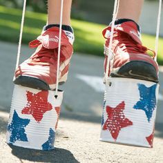 
                    
                        Cute Fourth of July Craft: Can-do Stilts for kids backyard activity during Fourth of July party
                    
                