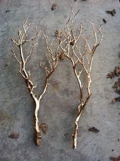 
                    
                        These were branches spray painted with gold paint. These were used in a wedding but I think that they would be beautiful for the holidays or other event.
                    
                