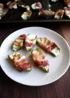 Goat cheese stuffed bacon wrapped jalapenos are perfect for Super Bowl Sunday. Not only is the heat between the teams going to be hot, but so will your dishes.