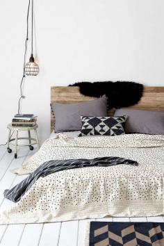 Wooden headboard and a low bed frame