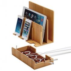
                    
                        This Bamboo device organizer keeps all your gadgets in one place and hides all the mess their chargers create. On top, you’ll find dividers for a laptop and a tablet, as well as three smartphone holders. Underneath, a concealed unit, which attaches to the top using magnets, hides all charging cables and organizes them with elastic bands.
                    
                
