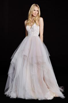 
                    
                        Beautiful blush color pop in this tulle ball gown wedding dress by Hayley Paige, Fall 2015
                    
                