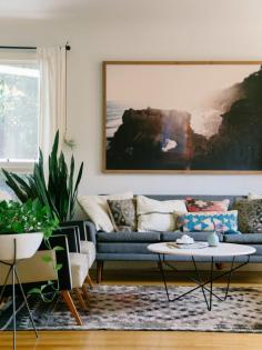 miid century inspired living room with amazing art