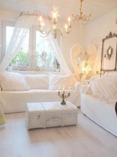 Shabby Cottage Chic all white room sofa nd chair and Nigel in corner