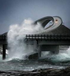 Atlantic Ocean Road in Norway... An 8.3-kilometer (5.2 mi) long section of County Road 64 is built on several small islands and skerries, which are connected by several causeways, viaducts and eight bridges—the most prominent being Storseisundet Bridge. (picture) Which is built high enough for the waves to crash through.