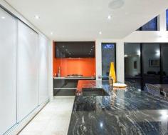 
                    
                        Kitchen, Stunning Modern Kitchen Island Design With Black And White Granite Countertop Also White Tile Floor Color Also Modern Black Kitchen Cabinet And Orange Wall Paint Color: Support Your Kitchen Room with Black and White Granite
                    
                