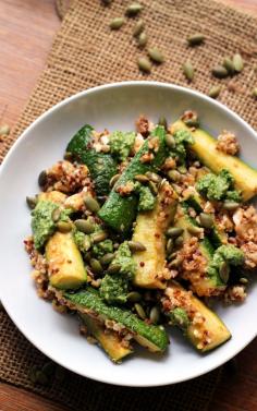 roasted zucchini and quinoa bowl is tossed with tangy cilantro pepita pesto