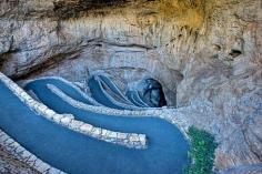 Carlsbad Caverns, New Mexico In this National Park beneath the rocky land lies more than 119 known caves, formed from limestone and sulfuric acid. Visitors can take the natural entrance (pictured on the right) or ride down the elevator 750 feet below ground. 29 Surreal Places In America You Need To Visit Before You Die