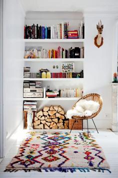 Gorgeous Moroccan rug and built in shelves.