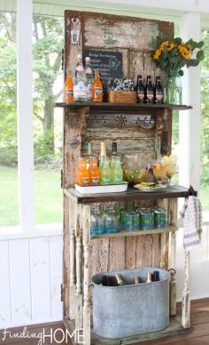 DIY Vintage Door Beverage Bar Station...make a summer/fall outdoor beverage station from a vintage door and old spindles.  Instructions included. Also a great addition to a picnic table for a drink station OR a place to sit extra plates of food- since we don't drink I can think of a thousand uses other than a bar- love the idea though!
