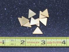 
                    
                        This is a 10 pack of 9.5 x 10.7mm brass triangles. They are 24 gauge thick and great for stamping, enameling etc. by EviesToolEmporium
                    
                