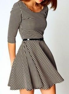 The black and white plaid is super classy, and the cut is perfect. I love the swingy bottom, complemented by the belt to highlight her waist and tie the look together