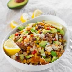 These spicy fish taco bowls are comfort food at its finest with a healthier twist. Fresh blackened spicy tilapia fillets, corn, black beans, red peppers and avocados make this dish a hearty, filling and most delicious lunch or dinner without the guilt.  #healthyeating #fish #tilapia //recipe