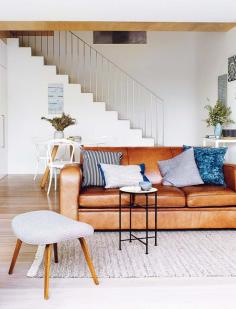 Sneaky Peeks at the interiors goodness that is Inside Out's summer issue... from Fancy NZ Design Blog - tan leather couch