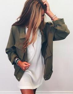 This army green jacket and white shirt dress together is beautiful !