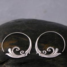 sterling silver hoop earrings.