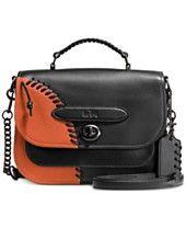 
                    
                        COACH RIP AND REPAIR SMALL LINK MESSENGER IN LEATHER
                    
                