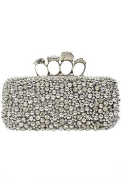 
                        
                            Silver or Champagne colored, blinged out, knuckle clutch. Fully lined interior.  Measures: 7" L x 3.5" H x 3" W  ONLY $59.99  Available Online at WWW.PETUNIASOFNAP...
                        
                    