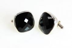 
                    
                        These handsome facet cut Black Onyx stones and 925 Sterling Silver cufflinks are the gift for this season. They dress up any suit to look sharp and they also come in Tiger Eye, Lapis Lazuli and Blood Stone.    Size of stone is approx 0.75" square and 0.25" thick.   Cuff Links weigh: 11.13 grams each  KenSuJewelry.com
                    
                