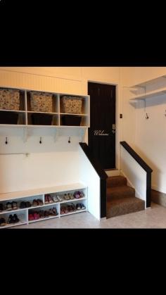 Garage mudroom. Also, notice the "welcome" painted on the door. Love that!