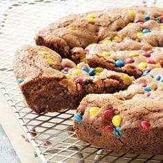 This recipe, a variation of one in her book Batter Up Kids Delicious Desserts cookbook, is from best-selling cookbook author and kids' cooking expert Barbara Beery, the founder of Batter Up Kids, Inc. "Kids adore giant cookie 'cakes' for birthday and team sport parties," says Barbara. Baking it in a cast iron pan is an easy way to keep the cookie perfectly round.