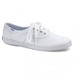 A wardrobe staple introduced in 1916, the Keds Champion Originals oxford shoe is constructed from breathable canvas with a soft lining and four-eye lace closure. A cushioned footbed with arch support and a roomy toe box enhance the natural walking motion. Rely on the flexible rubber sole of this women's sneaker for durable wear and dependable grip to complement your classic, carefree style.