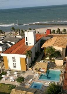 Ideally situated on the seafront of the beautiful Praia dos Artistas, this beach hotel is less than 5 minutes from the commercial and financial area in the city centre and close to some of the places of great historical importance, such as the Fortress of Kings and the Redinha Bridge. The business hotel is just 20 minutes from the Augusto Severo International Airport. This beach hotel offers a new level of quality through excellence in service and the comfort of its facilities, combining different concepts of functionality and practicality. Facilities available to guests at the 46-room business hotel include a lobby with a 24-hour reception, a hotel safe, games room, children's playground, kids' club and a restaurant. Guests may make use of the WLAN Internet access, room and laundry services, and a garage. The hotel offers comfortable rooms and suites with sea views. All are equipped with desks, high-speed Internet access, cable TV, a direct dial telephone, air conditioning, a minibar and an en suite bathroom with a shower. There is an outdoor swimming pool with children's swimming area and a poolside snack bar with sun loungers and parasols laid out ready for use.A breakfast buffet is served each morning and à la carte options are available for lunch and dinner.