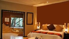 This intimate owner-run, 4 star boutique hotel lies in the serene country setting of Chartwell, a mere 15 minutes from Lanseria Airport and 20 minutes from Sandton CBD. A hidden gem offering a country feeling within minutes from the hustle and bustle of Johannesburg's city life, it is set amidst hundreds of indigenous trees and offers exclusivity, peace and tranquillity for both the corporate and leisure traveller. The bedrooms are spacious and luxurious, each with a private courtyard garden or patio overlooking the lush gardens. A popular venue for celebrating special moments, from a romantic wedding, to a spectacular corporate function, to an intimate barbeque dinner, private functions are catered for in various venues either inside or under the trees. Guests can enjoy a choice of dining options, from country style fine dining to buffet style home cooking or an African braia.