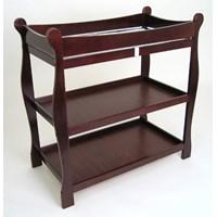 Our Sleigh Style tables were completely redesigned for 2004! New hardware and assembly system is a breeze to put together; and most of the hardware is now concealed so the attractive styling of the table is not interrupted! The changing table features two nicely sized shelves and ample room on top for changing diapers or dressing your baby. Overall size of 37.5L x 19W x 37.5H. Shelves measure 32L x 17.5D with a 1-3/8 lip around all four edges to keep items from falling off. Height between shelves is 11.5 inches. Changing table is made of quality hardwood with a non-toxic Cherry finish. When Baby outgrows this table it becomes a useful and attractive piece of furniture for holding clothes or toys. Also includes a soft mattress pad and safety strap. Safety rails enclose all four sides around the top of the table. Metal support bar beneath the changing surface provides additional stability. With the addition of two or four of our handy rattan baskets (sold separately) it makes it easy to store and organize your changing supplies! Illustrated assembly instructions included. Wipe clean with mild soap and a damp cloth when needed. Visit our Baskets department to browse our selection! Actual color/finish may vary slightly from screen display due to differences in computer display technology. Toys baskets and accessories shown with the table are for illustration purposes only and are not included with the product. Changing table can be used with children weighing up to 30 lbs. (13.6 kg).