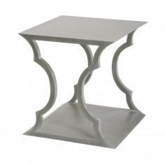 This solid mahogany side table is based on the artistic forms of Rococo architecture. The solid body gives the piece an air of substantiality while the delicate curves and details keep the piece from feeling heavy or visually overwhelming. The grey wood finish is in line with the latest transitional and modern design trends.