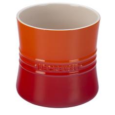 Keep the utensils and kitchen tools you use most frequently at your fingertips while adding a touch of colorful fun to your counter with this Le Creuset 2.75-qt. Enamel Utensil Crock. Designed to complement your existing Le Creuset cookware and serving containers, this crock is substantially sized for holding spatulas, tongs, whisks and turners within easy reach of your stovetop or prep area, so you can grab the tool you need quickly and easily whether you're stirring up cookie dough or flipping flapjacks on the griddle. It's made from premium stoneware that resists stains and won't absorb flavors or odors, making it a durable must have for your busy kitchen. This crock won't crack, craze or ripple because the stoneware used is less than 1 percent porous - a feature that blocks the absorption of moisture so that your crock looks great, inside and out, even after long-term use. Its enameled exterior lends it protection from scratches and metal marks for extended service life and resilience. Best Used For: Use this Le Creuset 2.75-qt. Enamel Utensil Crock to organize the most-needed utensils in your kitchen or display some fresh-cut flowers from the garden on your kitchen table. It's also ideal for serving breadsticks at your next Italian-inspired feast. Features: Dishwasher safe for convenient cleanup Limited 5-year warranty ensures satisfaction Le Creuset signature on front for added beauty on your counter Coordinates with cookware, dinnerware and serving dishes from Le Creuset