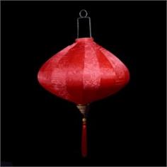 This is our new Vietnamese Silk Lantern for 2016! Made from 100% Brocade silk fabric with Jacquard weave designs stretched over a high-quality metal frame with a matching tassel below. PaperLanternStore's new premier Diamond Shaped Silk Lanterns are inspired by Vietnamese artisans and is meant to bring good fortune to you, your family, and your business. Expands like an umbrella in less than a minute and will be ready to hang and look amazing for any stage, event venue or New Year celebration. These beautiful Vietnamese lanterns, which are sometimes referred to Chinese Lanterns, are available in 3 colors and 5 sizes ranging from 13.75 inches wide x 12 inches long (w/o tassel) all the way up to 31 inches wide x 24.75 inches long (w/o tassel). This highly visible silk lantern is perfect for displaying indoors or outdoors in any party, wedding, hotel, or nightclub. Product Specifications: Main Lantern Width: 31 Inches. Main Lantern Length: 24.75 Inches. Handle Length: 11.75 Inches. Tassel Length: 13 Inches. Overall Dimensions (Inches, Width x Length): 31 W x 49.50 L. Color: Red. Shape: Diamond.