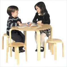 Table measures 28L x 28W x 21H in. Includes 4 coordinating stools Solid wood construction Available in your choice of finish Weight limit of 100 lbs per chair Recommended for ages 3 and upRounded table and chair design. The Guidecraft Nordic Table and Chair Set is perfect for little ones to enjoy games, snacks, and arts and crafts. Crafted from solid wood and available in your choice of finish, this set includes four chairs making it ideal for larger families and having friends over. About GuidecraftGuidecraft was founded in 1964 in a small woodshop, producing 10 items. Today, Guidecraft's line includes over 160 educational toys and furnishings. The company's size has changed but their mission remains the same; stay true to the tradition of smart, beautifully crafted wood products which allow children's minds and imaginations room to truly wonder and grow. Guidecraft plans to continue far into the future what they do best while always giving our loyal customers what they have come to expect: expert quality, excellent service, and an ever-growing collection of creativity-inspiring products for children. Your child and three friends will appreciate having their very own spot for crafts tea parties and other activities. This well-built GuideCraft Nordic table and chair set is sized just right for little bodies and will provide little hands with a place to stay busy and entertained. With solid wood construction this rounded table and four matching chairs are just right for the playroom the rec room or a child's bedroom. Choose from a solid colored all-natural finish or a wood and primary colors combination. Color: Natural.