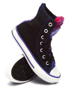Now the kids can kick it old school with the Converse All Star Party Hi. A canvas upper with original Chuck Taylor patch logo and accent stripes provide stylish details. vulcanized rubber outsole provides traction and durability.
