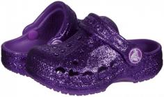Crocs Baya Glitter (Infant/Toddler/Youth) - Neon Purple Crocs, Inc. is a rapidly growing designer, manufacturer and retailer of footwear for men, women and children under the Crocs brand. All Crocs brand shoes feature Crocs' proprietary closed-cell resin, Croslite, which represents a substantial innovation in footwear. The Croslite material enables Crocs to produce soft, comfortable, lightweight, superior-gripping, non-marking and odor-resistant shoes. These unique elements make Crocs ideal for casual wear, as well as for professional and recreational uses such as boating, hiking, hospitality and gardening. The versatile use of the material has enabled Crocs to successfully market its products to a broad range of consumers.