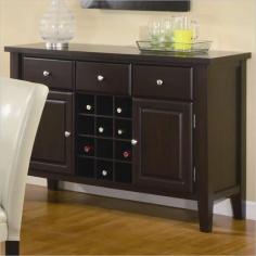 Create that extra bit of storage done in a classy style with this buffet style server. Featuring an amalgam of storage options including three drawers two doors and a 12 bottle wine storage rack this buffet style server is a functional addition to your dining room. Completed in a dark brown. with silver knob pull hardware combine this server with the coordinating tables and side chairs to. the smart and functional look. Dimensions: 18"W x 36"H x 52"D. Material & Finish: Composition Wood: Veneers & Solids. Wood & Finish: Dark brown. Style Elements: Style: Contemporary. Handles & Hardware: Burnished knob pull hardware. Case Detail: Straight block legs clean straight edges.