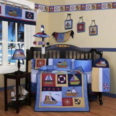 GNY1009: Features: -Material: 65 / 35 Percent of Polyester / Cotton-Machine washable. Includes: -Set includes: Crib quilt, two valances, skirt, crib sheet, bumper, diaper stacker, toy bag, two pillows, three wall hangings. Color/Finish: -Decorative accent pillows: 10" H x 10" W. Dimensions: -Crib quilt: 45" H x 36" W-Crib bumper: 10" W x 158" D-Fitted crib sheet: 52" H x 28" W-Window valances: 16" H x 58" W-Crib skirt: 28" H x 52" W-Toy bag: 20" H x 14" W.