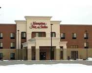 a slice of heaven in the heartland. welcome to the Hampton Inn & Suites Ankeny Conveniently located mere seconds off of I-35 and just ten minutes north of downtown Des Moines, the Hampton Inn & Suites Ankeny is an ideal spot to enjoy a relaxed pace and relish the discovery of fun and exciting attractions in and around this inviting Midwestern town. Once a tiny railroad village of less than 500 people, Ankeny is now home to a John Deere manufacturing plant, four college campuses and the bustling, historic Uptown Ankeny shopping and cultural district. After exploring the antique shops, craft galleries and quaint bistros uptown, make the short drive down I-35 to Des Moines for even more abundant shopping and dining destinations, pro-caliber sporting events and a tour of downtown that features the historic State Capitol and the Des Moines Art Center The friendly team at the Hampton Inn & Suites Ankeny is delighted to host your tour of Iowa's heartland. Start your morning with a stroll through the shops in historic Uptown Ankeny as you snack on fresh fruit from the farmer's market. Plan your summer vacation around the internationally-acclaimed Iowa State Fair and celebrate the agricultural roots of the Midwest amidst the delightful backdrop of downtown Des Moines, located just minutes from our hotel in Ankeny. For a taste of Hollywood in the heartland, travel a few miles southeast of Des Moines to Winterset, Iowa and tour the covered bridges that were featured in the film Bridges of Madison County and visit the birthplace of legendary actor John Wayne, who was born here in 1907. The charming and historic covered bridges of Madison County, the vibrant energy of downtown Des Moines and the charm of Uptown Ankeny all add up to a slice of heaven in the heartland when you visit the Hampton Inn & Suites Ankeny services & amenities Even if you're in Ankeny to enjoy the great outdoors, we want you to enjoy our great indoors as well. That's why we offer a full range of services and amenities at our hotel to make your stay with us exceptional. Are you planning a meeting? Wedding? Family reunion? Little League game? Let us help you with our easy booking and rooming list management tools * Meetings & Events * Local Restaurant Guide